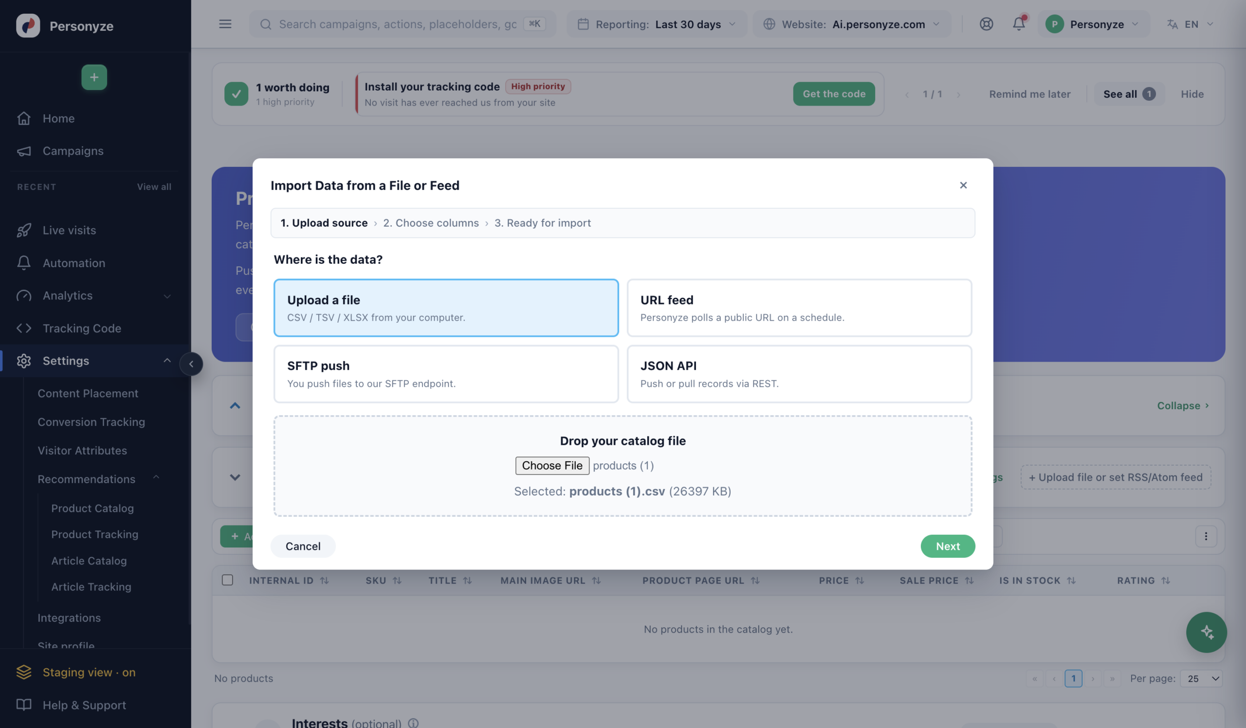 The Import Data from a File or Feed wizard — step 1, Upload source, with Upload a file, URL feed, SFTP push, and JSON API options