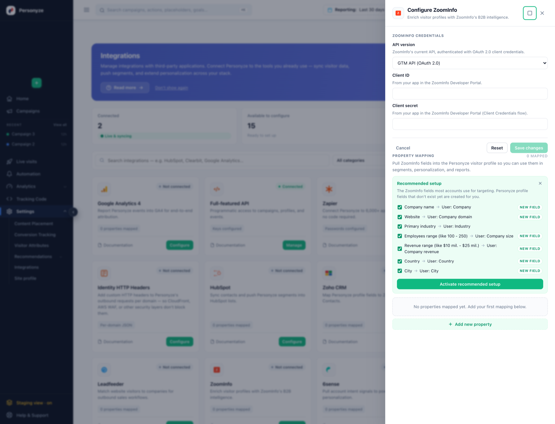 The Configure ZoomInfo drawer showing the API version selector, Client ID and Client secret fields, and the recommended property mappings